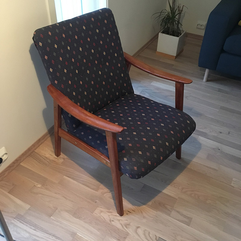 Used and tired armchair